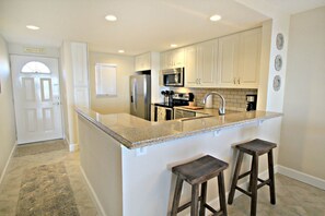 Fridge, microwave, oven, stovetop - St Augustine Beach & Tennis Club 409-Three Bedroom Oceanfront Condo (St. Augustine)