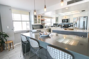 Fridge, microwave, oven, stovetop - Sand Dollar 1-506-Four Bedrooms, Direct Oceanfront Condo (St. Augustine)