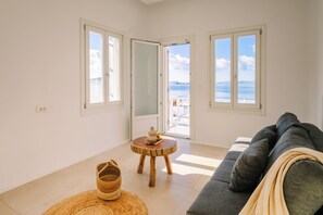 King Suite with Balcony and Sea View | Laptop workspace, blackout drapes, iron/ironing board, free WiFi