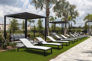 Outdoor pool -  Adeline Apartments 15m to Parks, Pet Friendly, Free Parking by Heavenly Homes (Kissimmee)