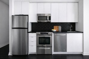 Executive-Suite, 1 Queen-Bett, Balkon, Stadtblick | Eigene Küche