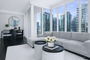 Executive-Suite, 1 Queen-Bett, Balkon, Stadtblick | Wohnbereich