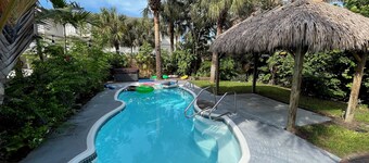 Palms Gulf-View Retreat with wraparound windows, open breezes, and spacious deck