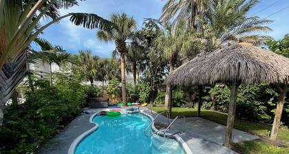 Palms Gulf-View Retreat with wraparound windows, open breezes, and spacious deck