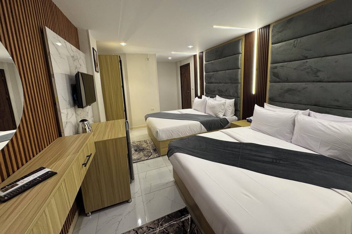 Deluxe Quadruple Room | In-room safe, free WiFi