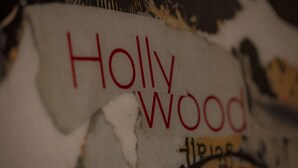 A torn paper with "Hollywood" written on it. - Hotel Zur Feldmühle (Arnsberg)
