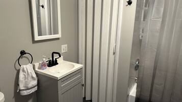 Hair dryer, towels, soap, toilet paper