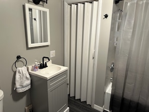 Hair dryer, towels, soap, toilet paper