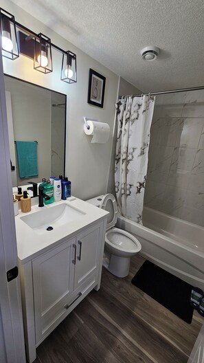 Towels, soap, toilet paper - Comfortable Guest Suite at Kinglet Gardens (Edmonton)
