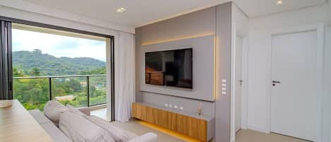 Comfort Apartment, City View | Living area | Flat-screen TV