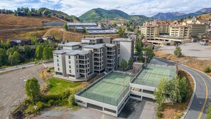 【Location Proof】 Aerial with Plaza in the foreground and the resort’s lifts behind — 100-yard claim, visible. - Plaza 538 at Woodcreek — 100 Yds to Silver Queen | 2 Kings | Crested Butte (Crested Butte)