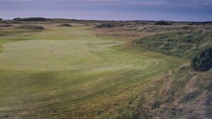 A golf course with a putting green and sand bunkers. - Sarah's Woodland Golf Stays (Waterloo)