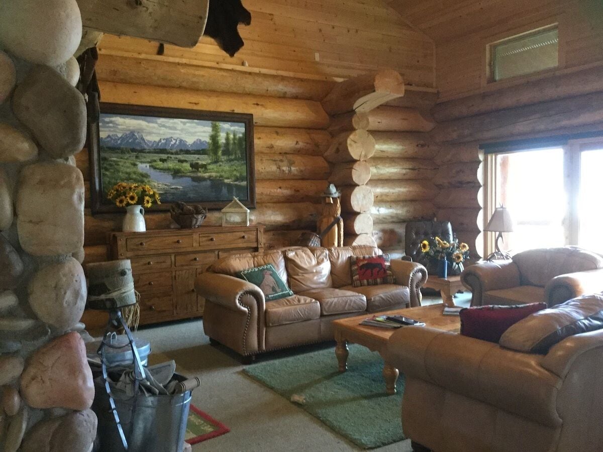 Deluxe Cabin, Lake View | Living area | TV, fireplace, DVD player