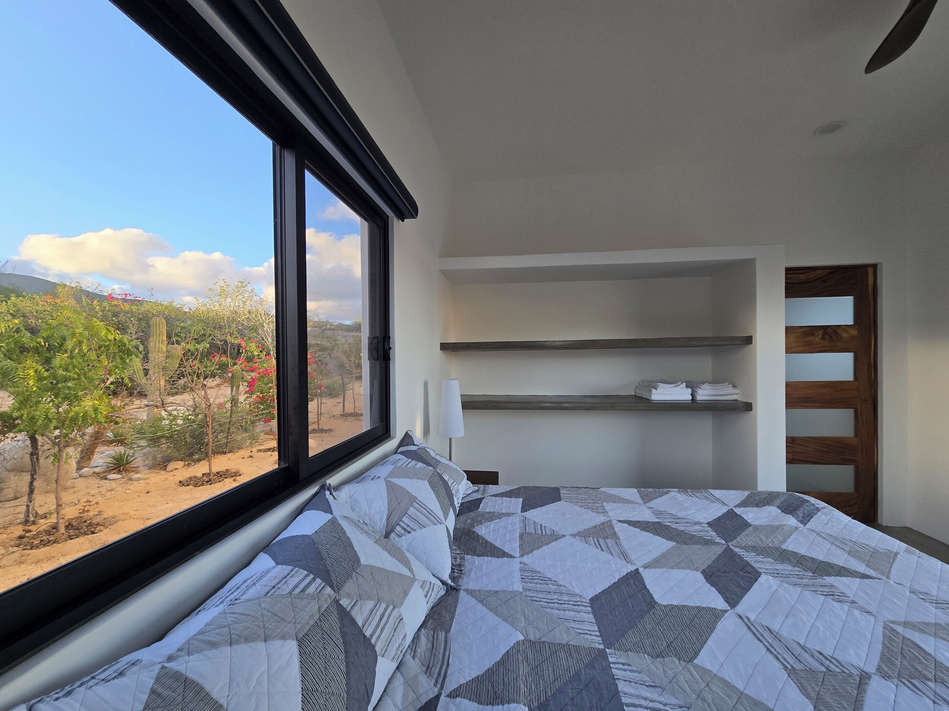King size bed set up with desert view out back. 