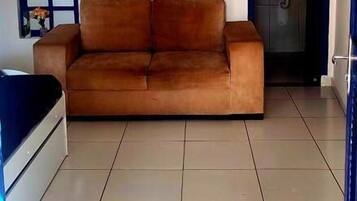 Superior Double Room, Patio, Courtyard View | Living area | TV