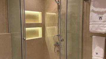 Shower, towels, soap, toilet paper