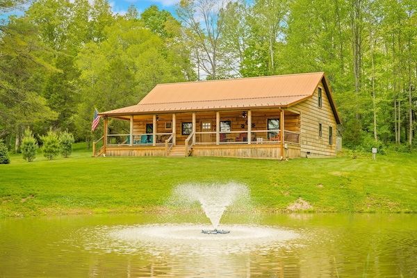 Charming cabin retreat with peaceful pond and fountain views