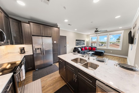 Fridge, microwave, oven, stovetop. Midnight Strings - Cozy 2BR Retreat Near Broadway