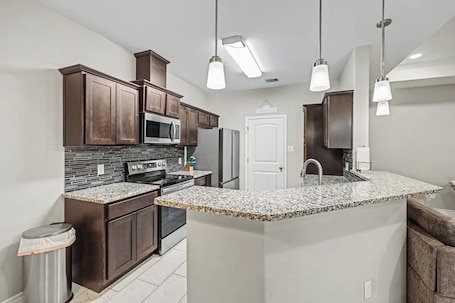 Fridge, microwave, oven, stovetop. Welcome to Coastal Haven