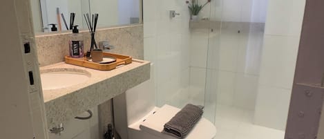 Hair dryer, towels, soap, toilet paper