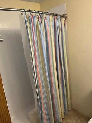 Shower, towels, toilet paper