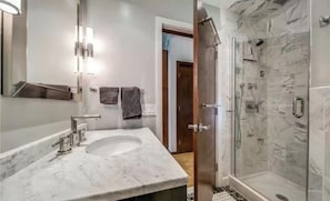 Shower, towels, toilet paper