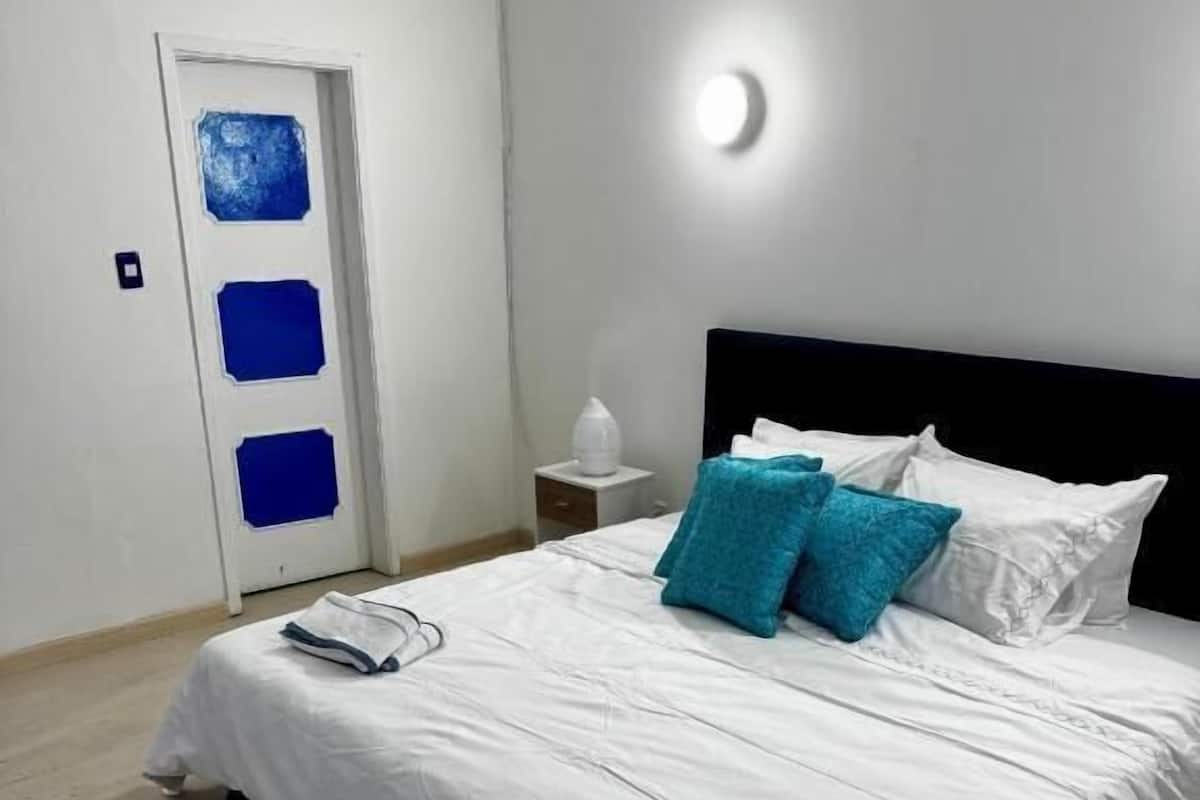 Deluxe Double Room, Courtyard View | Iron/ironing board, free WiFi