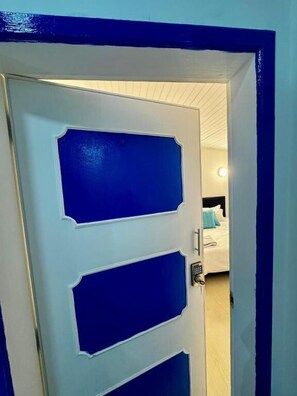 Kamar Double Deluks, pemandangan halaman | Kedap suara, setrika/meja setrika, dan Wi-Fi gratis