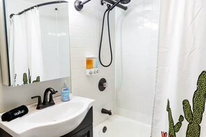 Hair dryer, towels, soap, shampoo - Wrigleyville Oasis • Modern Comfort Steps from Wrigley Field (Chicago)