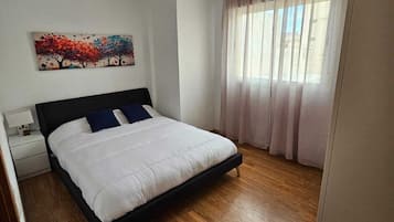 2 habitaciones, tabla de planchar con plancha, wifi y ropa de cama