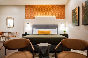Deluxe Quadruple Room | In-room safe, blackout drapes, iron/ironing board, free WiFi
