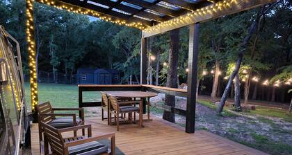 Stylish Airstream RV Near Lake Texoma with Deck and Woodland Trails