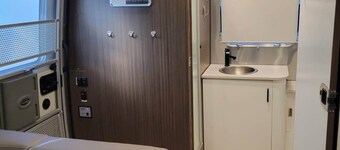 Stylish Airstream RV Near Lake Texoma with Deck and Woodland Trails