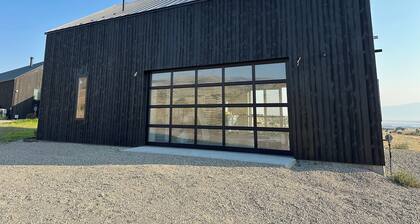 Relax in a private, designer two-story suite overlooking the Madison Valley