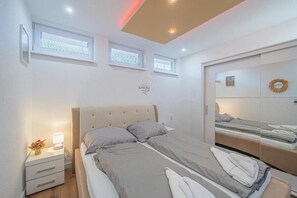 Departamento familiar | Tabla de planchar con plancha y wifi gratis 