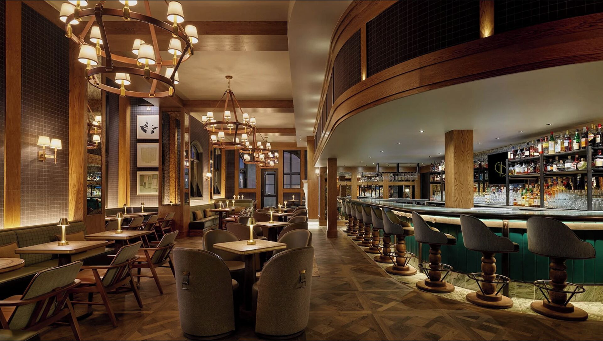 A bar area with multiple seating options and a well-lit interior.