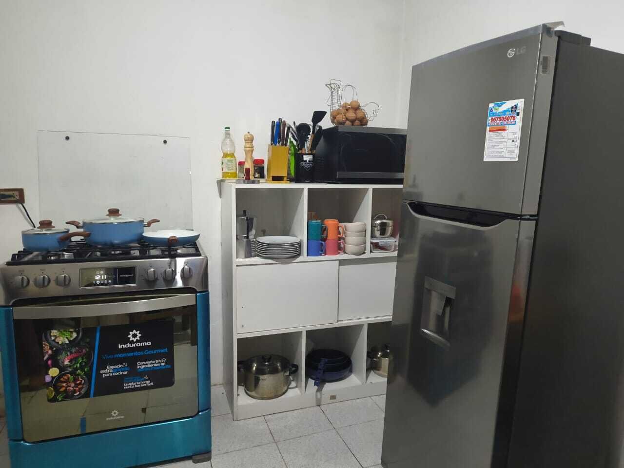 Full-sized fridge, microwave, stovetop, dishwasher