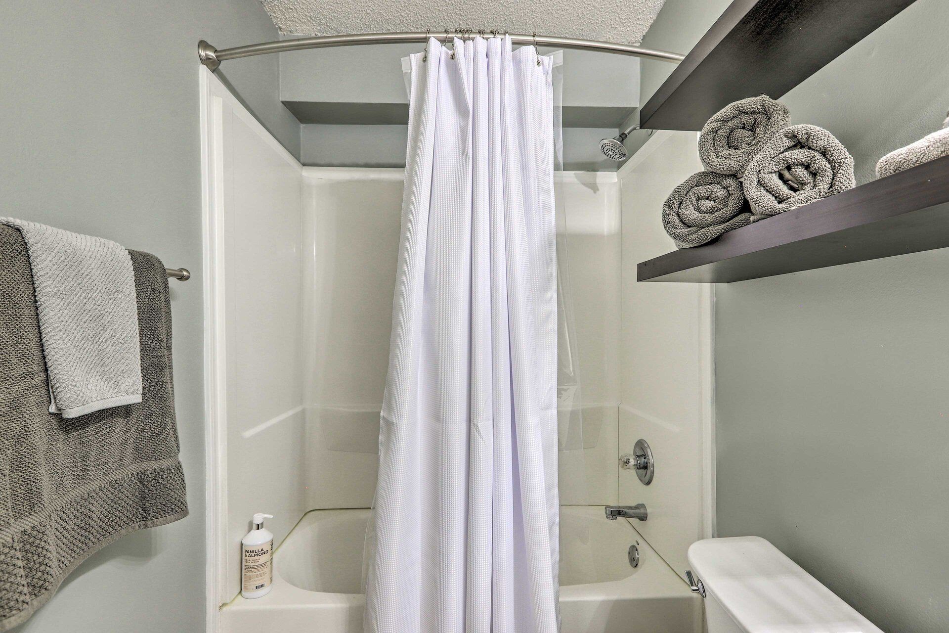 Hair dryer, towels, soap, toilet paper