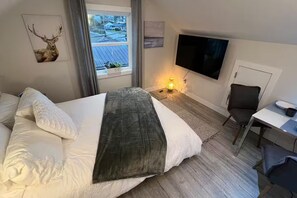 2 slaapkamers, een strijkplank/strijkijzer, wifi, beddengoed