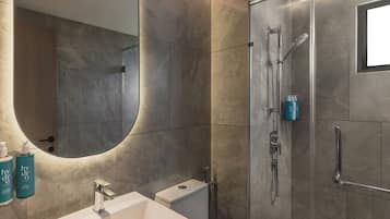 Shower, hair dryer, bathrobes, towels