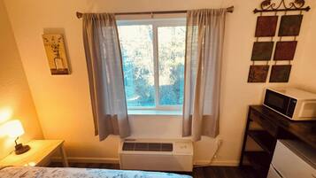 1 chambre, bureau, accès au Wi-Fi (inclus), literie fournie