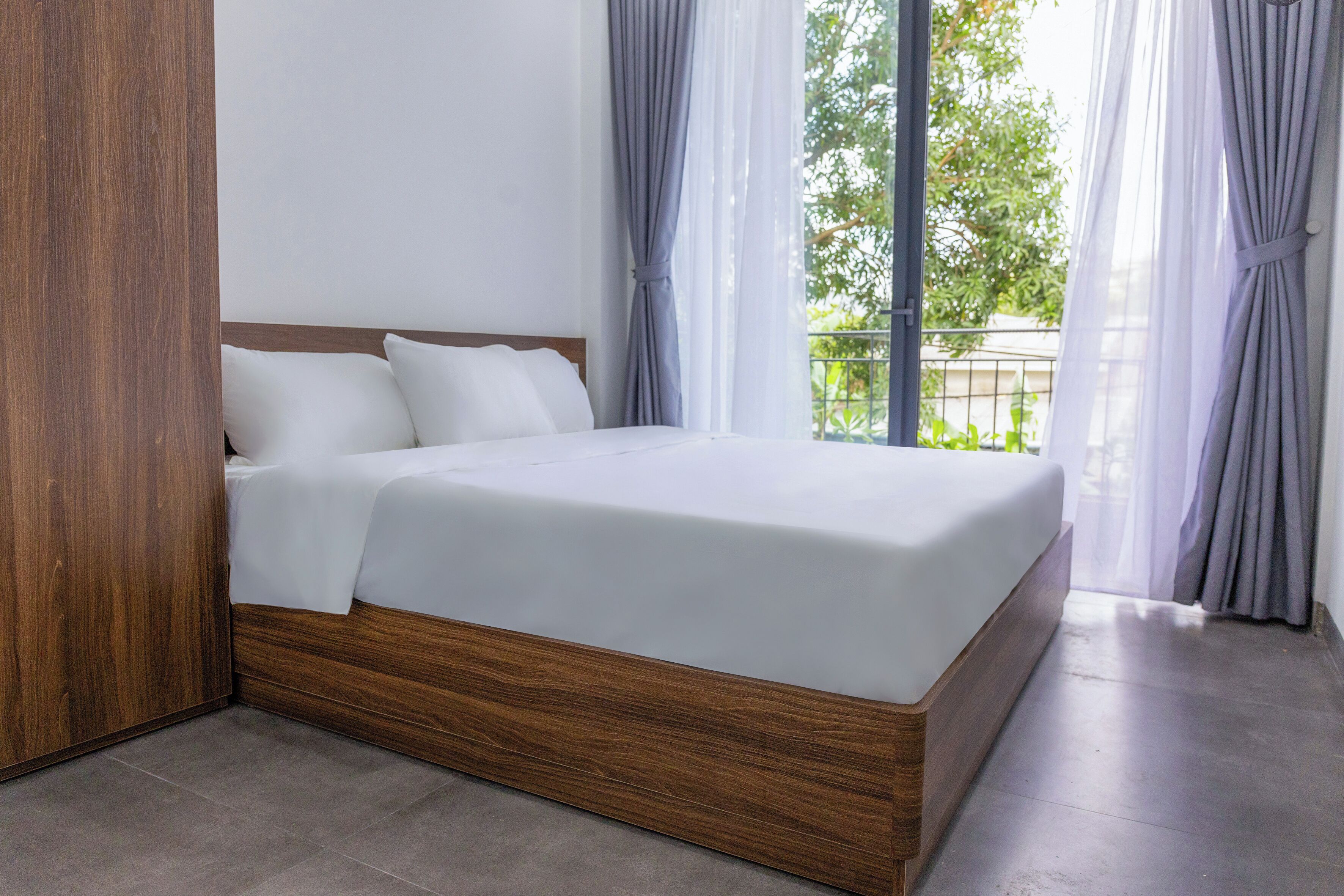 Kamar Double Deluks, balkon, pemandangan kota | Tirai kedap cahaya, setrika/meja setrika, dan Wi-Fi gratis