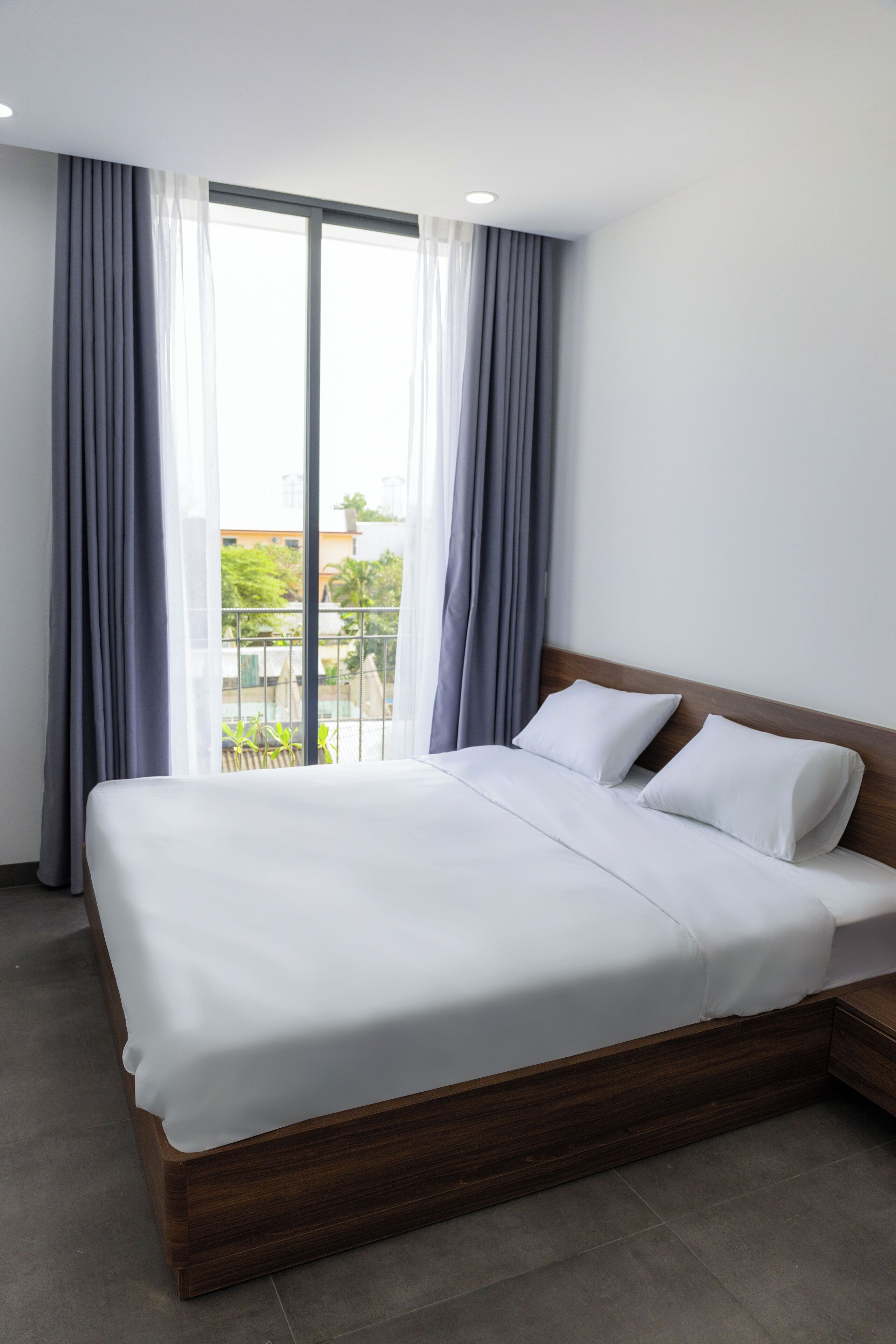 Kamar Double Deluks, balkon, pemandangan kota | Tirai kedap cahaya, setrika/meja setrika, dan Wi-Fi gratis