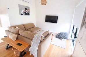 Smart TV, fireplace, foosball, books