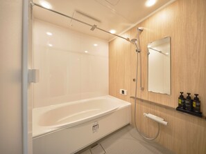 Suite, City View | Bathroom | Combined shower/tub, hair dryer, towels, shampoo - WELLSTAY Namba Apartmenthotel-Cocochill (Osaka)
