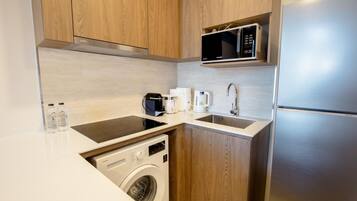 Fridge, microwave, stovetop, coffee/tea maker