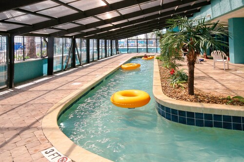9th floor studio with private balcony, pools, direct beach access & golf nearby