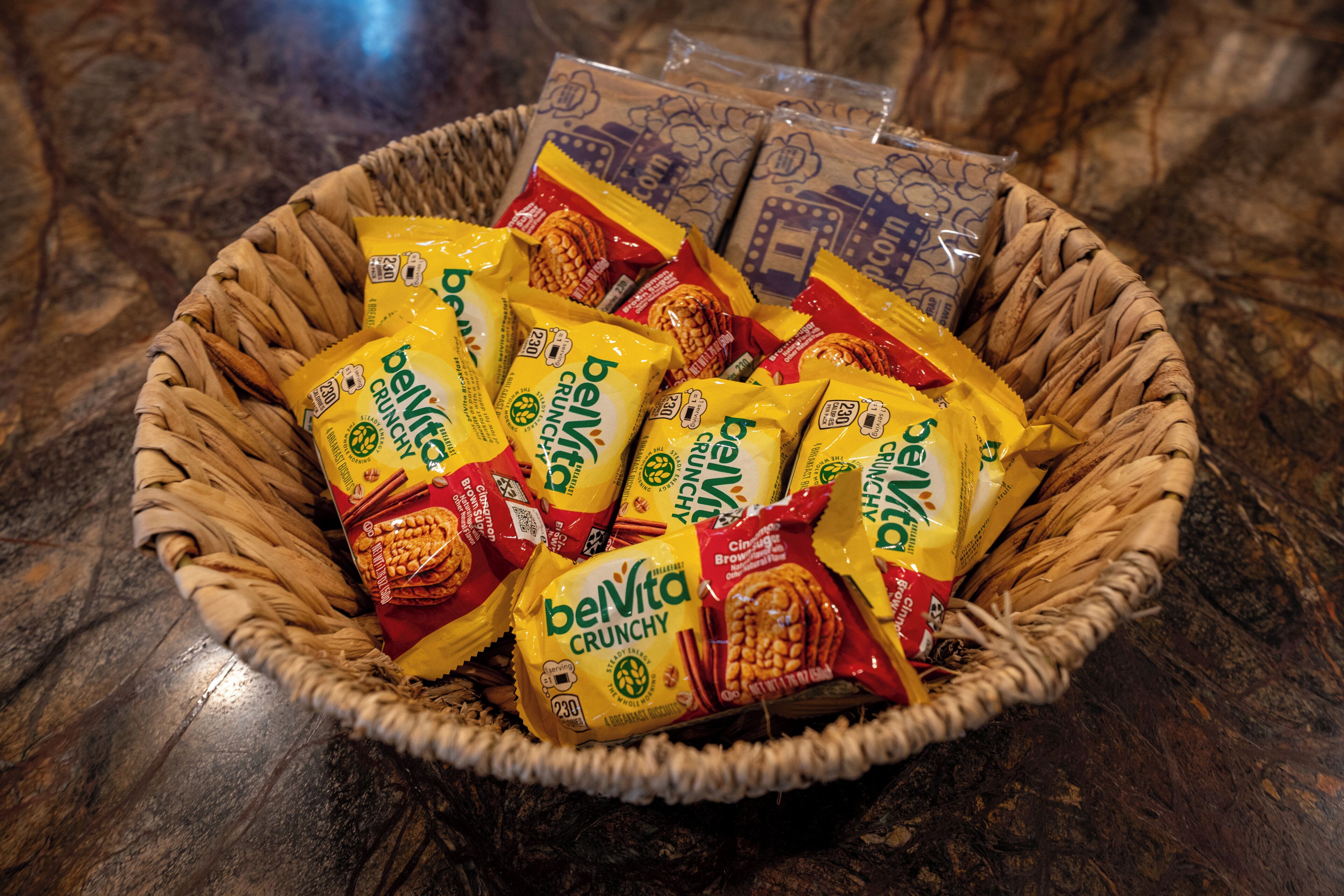 A basket filled with various snacks.