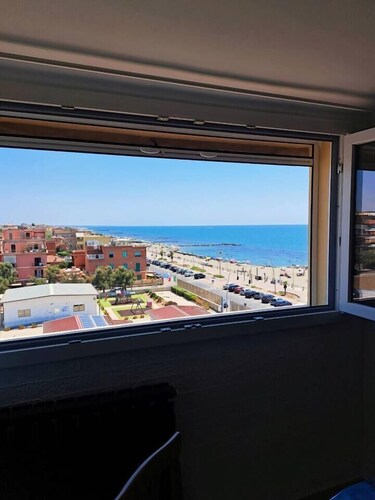 Elegant Seafront Apartment in Ostia | Beach Access