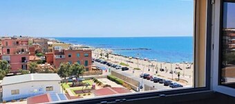 Elegant Seafront Apartment in Ostia | Beach Access